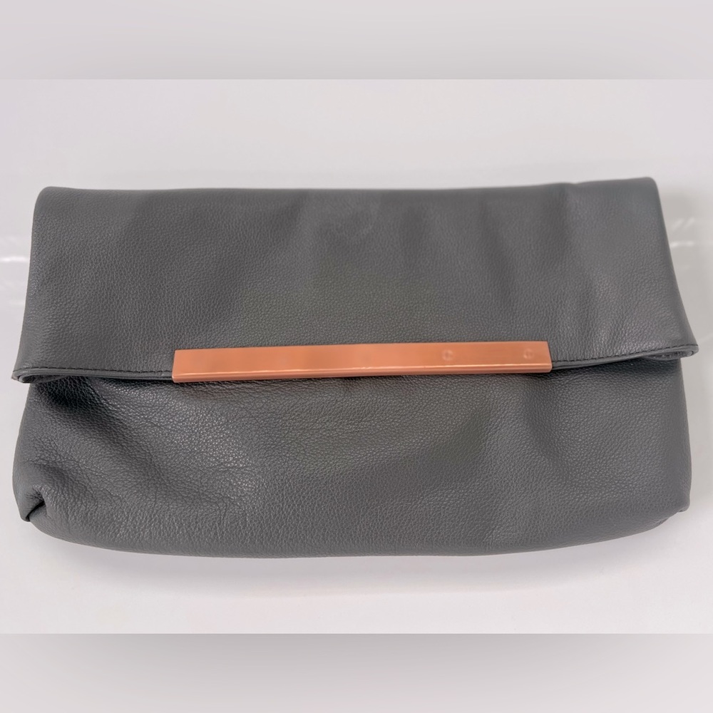 Joie Genuine leather clutch slate color with rose gold metal detail.